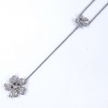 An 18ct white gold diamond set flower drop pendant necklace, lower pendant height 18.1mm, necklace