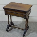 A 19th century French mahogany sewing table, with carved mouldings and barley twist supports,