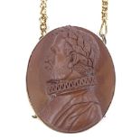 A relief carved lava cameo pendant necklace, depicting male Tudor portrait, possibly Sir Francis