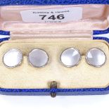 A pair of 9ct gold mother-of-pearl circular cufflinks, panel diameter 13.8mm, 4.2g