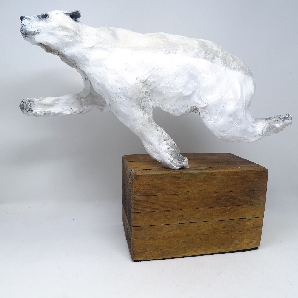 Clive Fredriksson, clay sculpture, running polar bear, length 16", height 14.5"