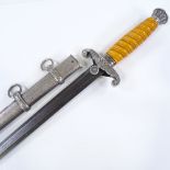 Second War Period German Army Officer's dagger with Damascus blade and yellow composition grip,