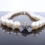 A single strand Princess South Sea pearl necklace, with 14ct white gold diamond set clasp, pearl