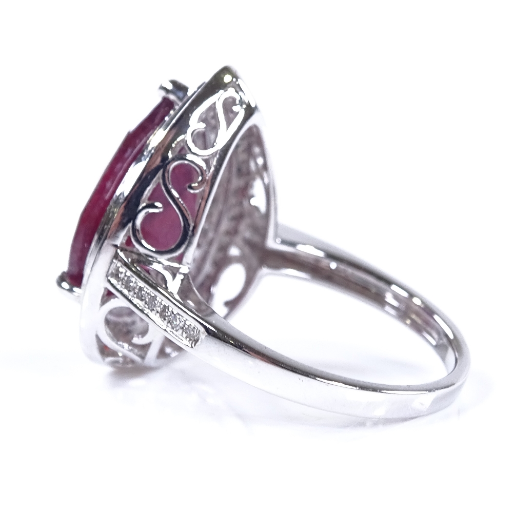 A 14ct white gold ruby and diamond cluster ring, pear-cut ruby approx 7.43ct, total diamond - Image 3 of 4
