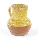 Robert Fishley (1808 - 1887), Fremington Pottery, ochre glaze slip decorated earthenware jug,