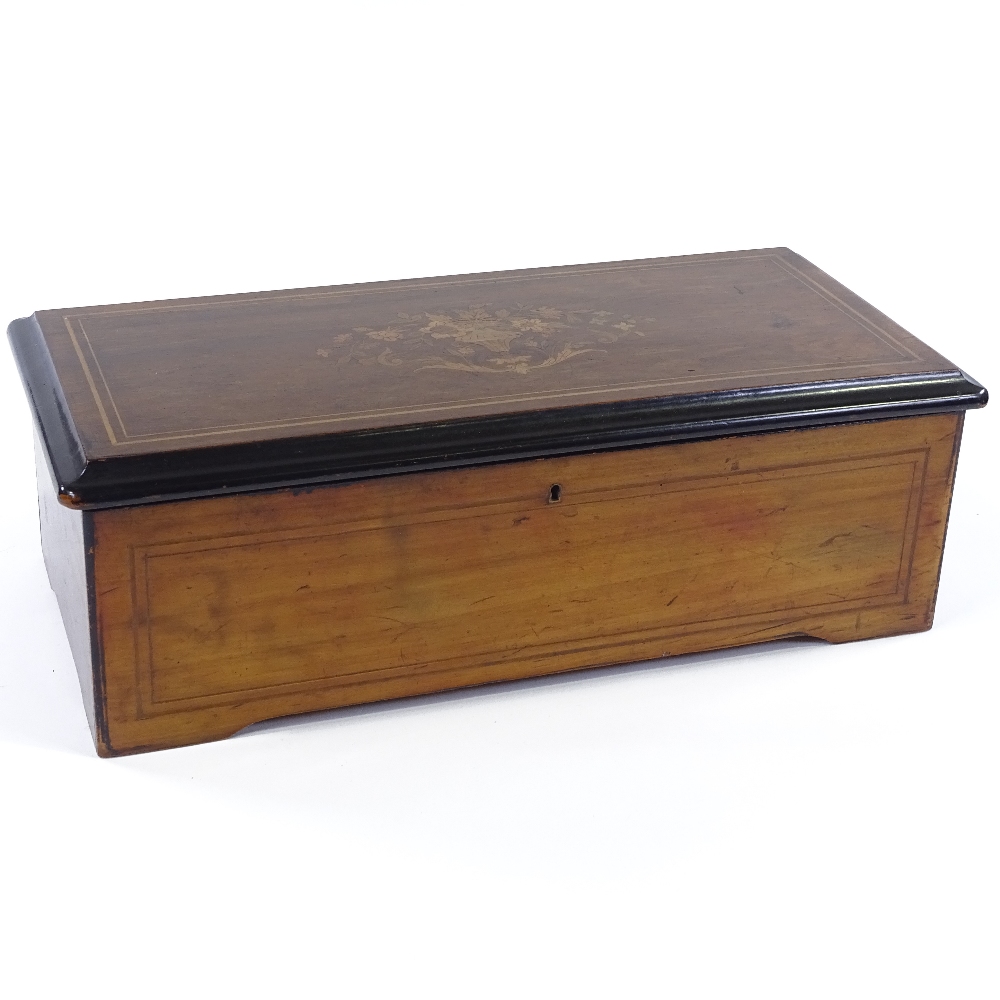 A 19th century Swiss rosewood and marquetry inlaid musical box, playing eight aires on a 21cm - Image 3 of 3