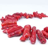 A large graduated red coral necklace, with sterling silver clasp, necklace length 54cm, 401.7g