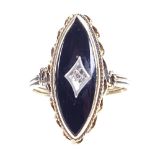 An unmarked gold onyx and diamond marquise panel ring, with rope twist bezel, setting height 24.1mm,