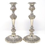 A pair of Victorian silver plated candlesticks, with relief acanthus leaf decoration and removable