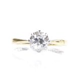 An 18ct gold 0.6ct solitaire diamond ring, platinum-topped settings, setting height 6mm, size H, 2g