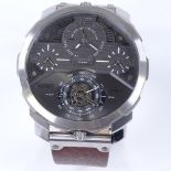 DIESEL - a stainless steel Machinus quartz 4-timezone wristwatch, grey dial with quarterly Arabic