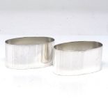 A modern pair of oval silver napkin rings, by Carr's of Sheffield, hallmarks Sheffield 1997,