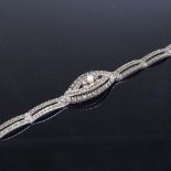 A Swedish silver pearl and marcasite bracelet, with openwork settings, stamped 830S, bracelet length