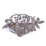 An unmarked gold silver and diamond SBI initial brooch, with pierced settings, brooch length 33.5mm,