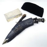Kukri with original sheath and belt mount, together with Malay hat and silver presentation cigarette