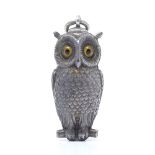 A late Victorian silver novelty owl propelling pencil, with realistic form feathers and inset