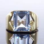 An unmarked gold blue topaz ring, maker's marks GAM, setting height 10.7mm, size G, 2.7g