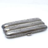 A George V silver torpedo cigar case, with engraved foliate decoration, by Patterson & Sons Ltd,