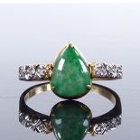 A 9ct gold jade and diamond dress ring, with pierced heart-shaped back, setting height 11.2mm,