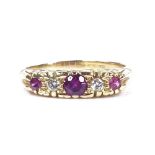 An 18ct gold 5-stone ruby and diamond half-hoop ring, with scroll engraved bridge, setting height