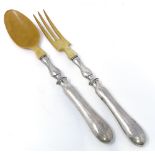 A pair of French silver-handled ivory salad servers, fork length 28cm