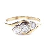 A 9ct gold 3-stone diamond crossover ring, setting height 7.4mm, size N, 2.9g