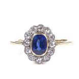 An 18ct gold sapphire and diamond cluster flowerhead ring, total diamond content approx 0.24ct,