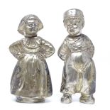 A pair of Continental novelty silver pepperette cruets, modelled as a Dutch boy and girl, stamped