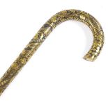 A Japanese Komai parasol handle, Meiji Period, with finely gilded and engraved landscape decorated