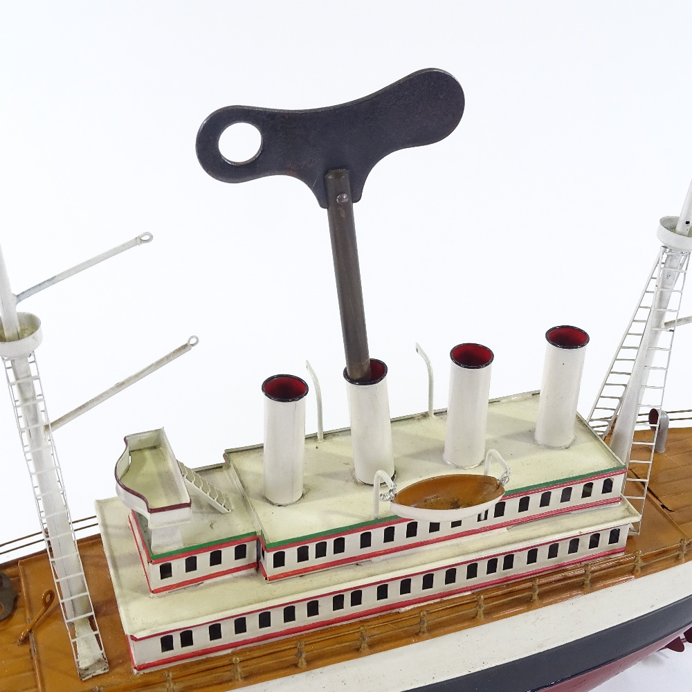 George Carette, Nuremberg, 4-funnel clockwork tinplate passenger liner The Mauretaina, 1922, - Image 3 of 3