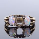 A 9ct gold opal and diamond half-hoop ring, with engraved scrollwork bridge and shoulders, setting