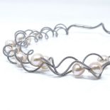 A Nadia Visram designer steel and pearl necklace, made for the White Room, necklace length 44cm,