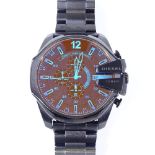 DIESEL - a black plated steel Mega Chief quartz chronograph wristwatch, black dial with white