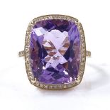 A 14ct gold amethyst and diamond cluster ring, cushion-cut amethyst approx 9.4ct, total diamond