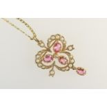 Pink sapphire and pearl pendant necklace, in 9ct gold, trefoil form pendant set with three oval