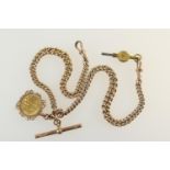 9ct gold double watch albert, graduating curb links with T-bar and spring clips and with George V