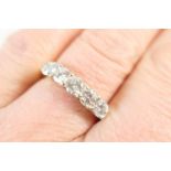 Diamond five stone half eternity ring, the brilliant cut stones each of approx. 0.25ct, totalling