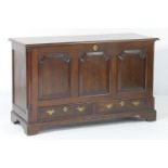 Oak mule chest, 19th Century, the top lifting over three fielded panels within quarter pilasters and