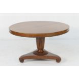 George IV mahogany tilt top breakfast table, circa 1825, the circular top with a beaded edge,