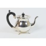 George V bachelor's silver teapot, maker W D, Sheffield 1916, plain baluster form with shaped