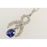 Edwardian sapphire and diamond pendant necklace, the old cushion cut sapphire of approx. 1ct of good