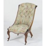 Early Victorian rosewood and upholstered nursing chair, circa 1845, deep buttoned back upholstered