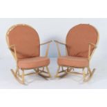 Pair of Ercol Shaker style rocking chairs, with wide hoop and stick backs, open arms, elm seats,