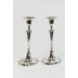 Pair of Edwardian silver candlesticks, in the Adam style, by Goldsmiths & Silversmiths Company