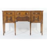 Edwardian mahogany and inlaid sideboard, having a plate glass top, serpentine front, crossbanded and