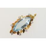 Garrard aquamarine and diamond pendant, hallmarked London 1975, the marquise cut aquamarine of