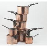 Set of Victorian copper pans by Benham & Froud, comprising 24cm and 20cm lidded pans, three 16.5cm