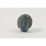 Small carved blue stone head, possibly Alexander the Great, indeterminable date but possibly ancient