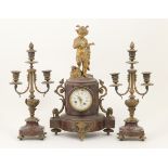 French ormolu and scagliola marble clock garniture, circa 1890, the clock case surmounted with a