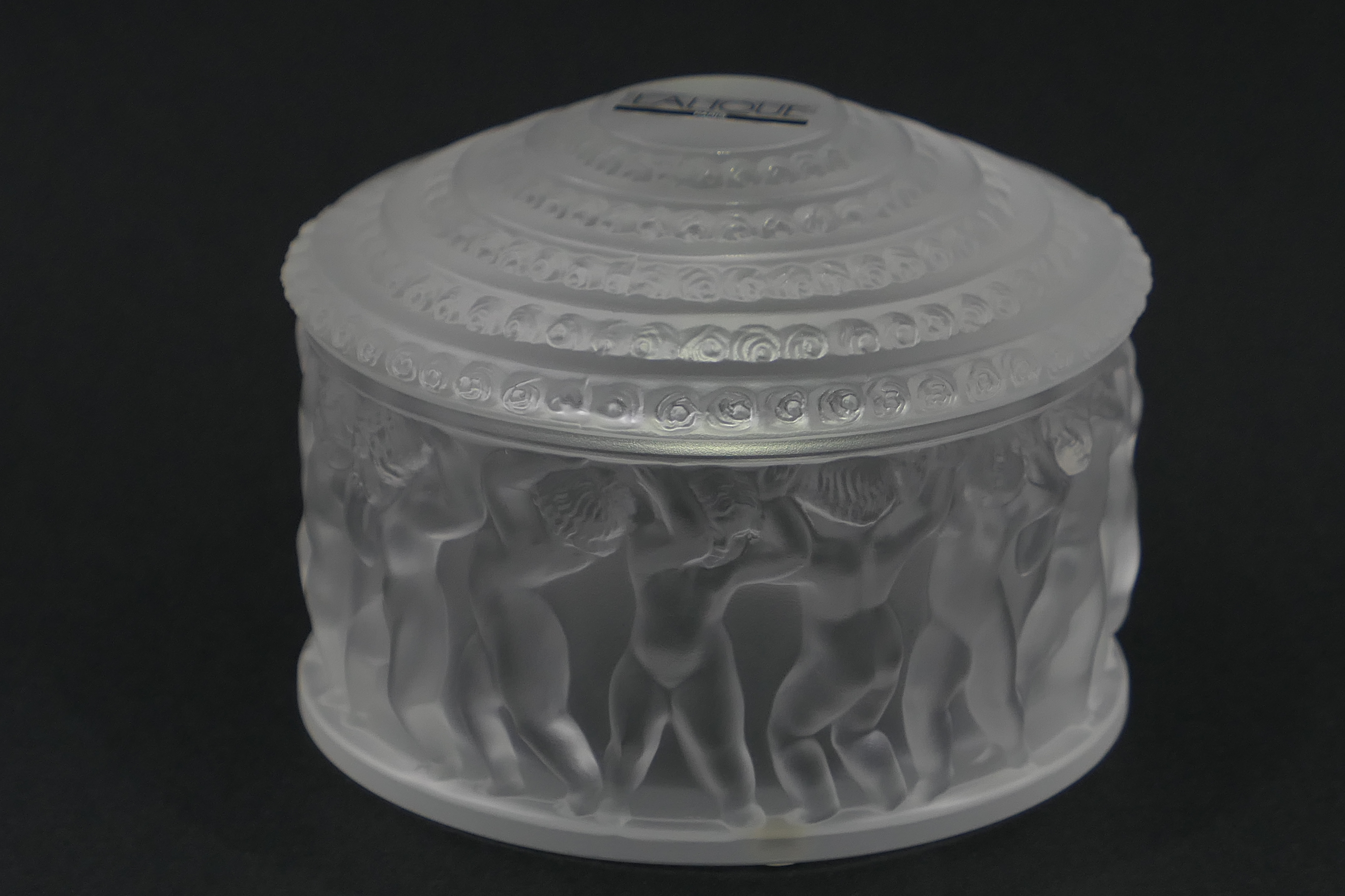 Lalique 'Enfants' box and cover, circular form moulded with a band of cherubs beneath a domed cover,